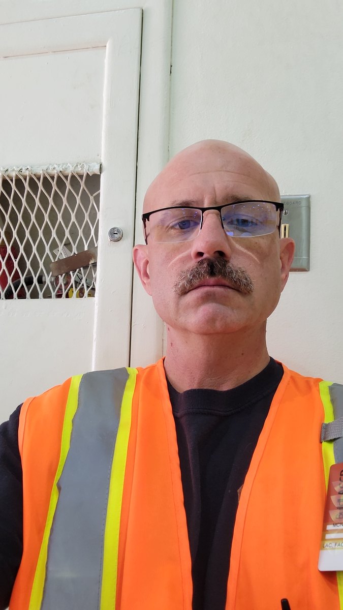 Michael Karl McNeil on site in high-visibility vest